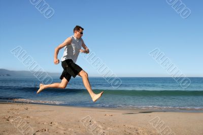 man running on the beach