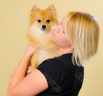 Model with a Pomeranian