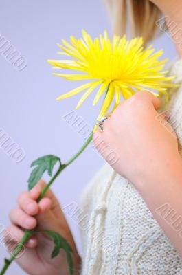 Woman with a Yellow Flower