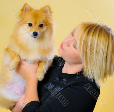Model with a Pomeranian