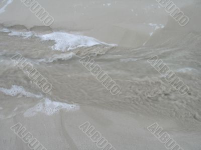 water and sand close-up