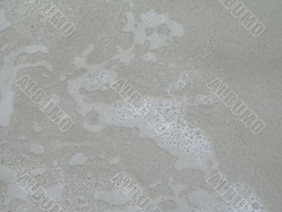 water and sand close-up