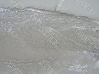 water and sand close-up