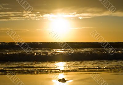 Yellow sunset over the sea