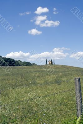 Little church with cypresses in Tuscany