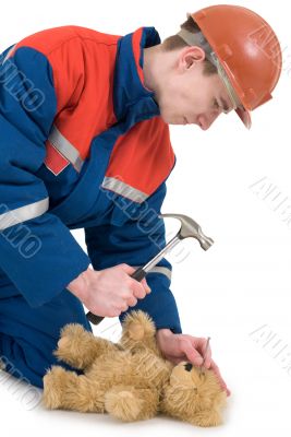 Labourer with bear and hammer