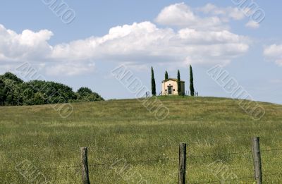 Little church with cypresses in Tuscany