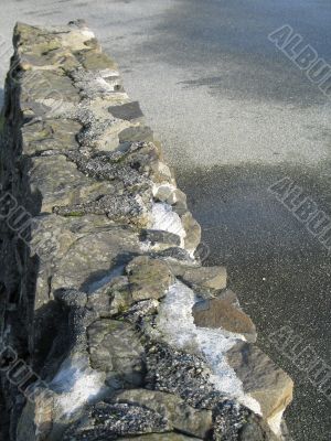 an old gray stone wall