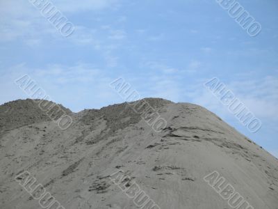 dirt pile and blue sky