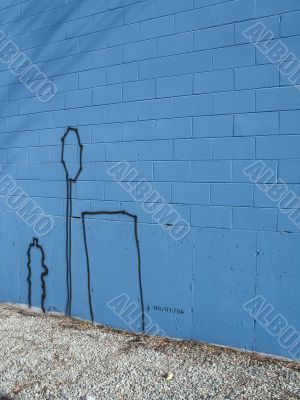 graffiti on a blue wall