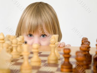 Little girl and chess