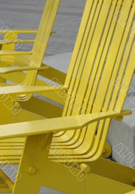 yellow chairs in a park