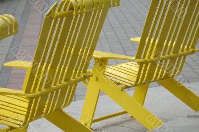 yellow chairs in a park