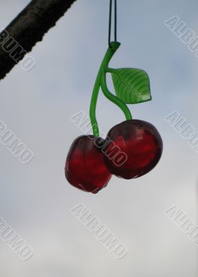 red plastic cherries