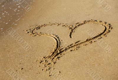 Heart on sand