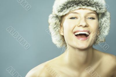 Blond Woman Wearing Fur Hat
