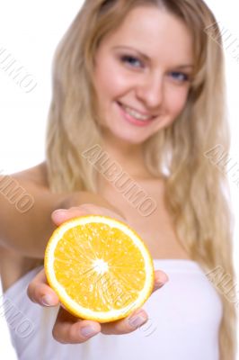 woman holding the orange