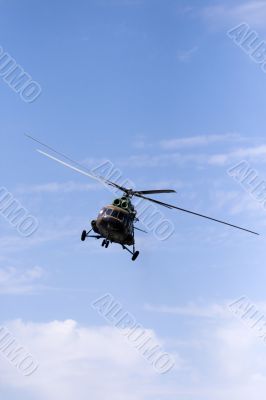 Helicopter in sky