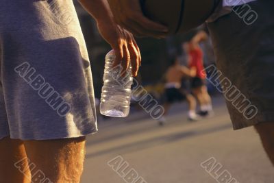 Man Holding Bottled Water