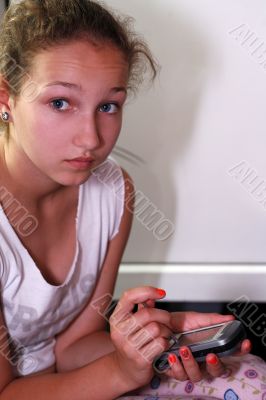 Young girl with the phone