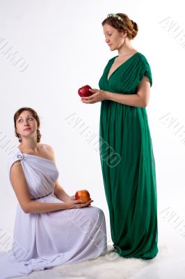 Two ladies and two apples