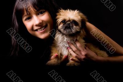 Smiling glaourgirl with puppy