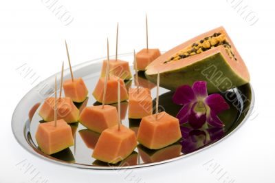 Papaya on a silver tray