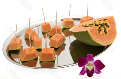 Papaya on a silver tray