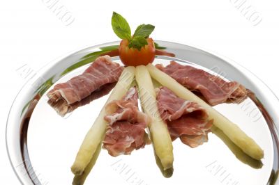 asparagus with parma hams on silver tray