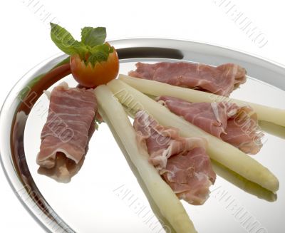 asparagus with parma hams on silver tray
