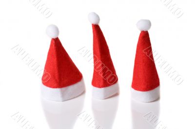 Three small santa hats