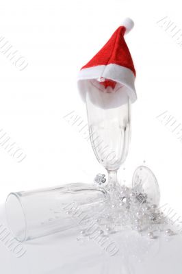 Champagne glass decorated with santa hat