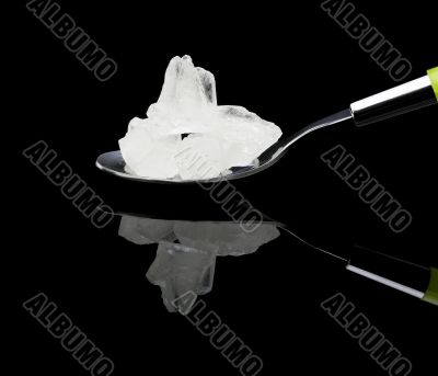 crystal sugar on a spoon