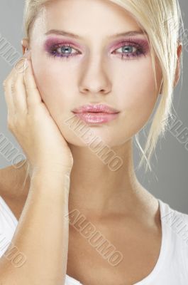 Girl wearing makeup made of flowers