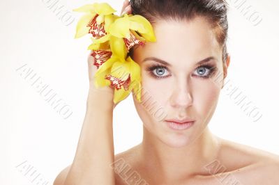 happy young woman with yellow flower
