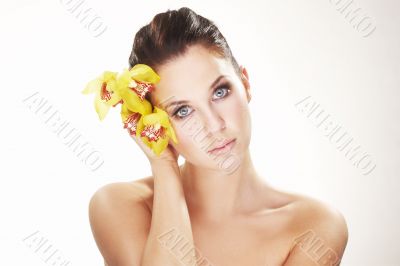 happy young woman with yellow flower