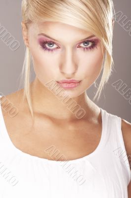 Girl wearing makeup made of flowers
