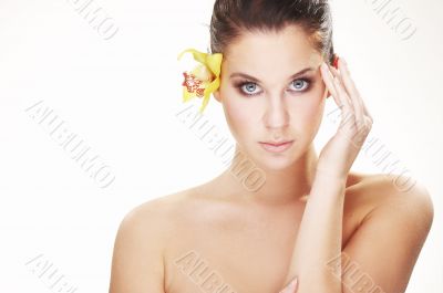 happy young woman with yellow flower