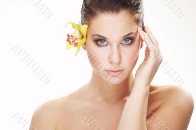 happy young woman with yellow flower