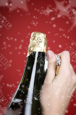 Opening champagne bottle