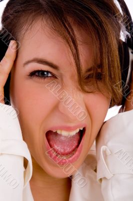screaming young woman listening music