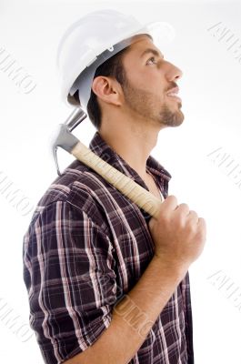 side pose of architect holding hammer