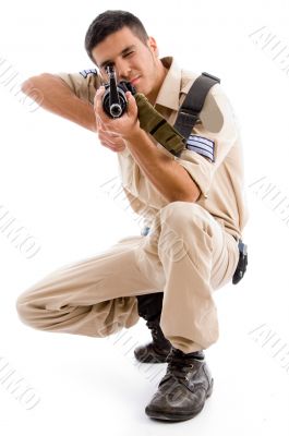 soldier going to shoot with gun