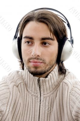 young guy male enjoying music with headphones