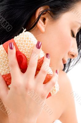 top view of woman scrubbing her neck