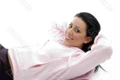 side pose of laying smiling female