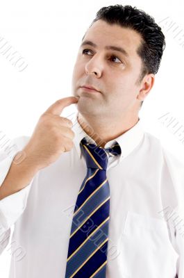 man itching with finger his cheeks