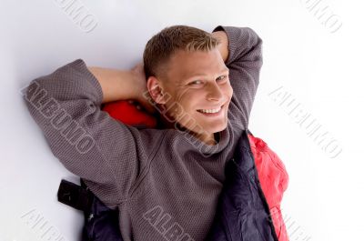 smiling young guy posing in sleeping bag
