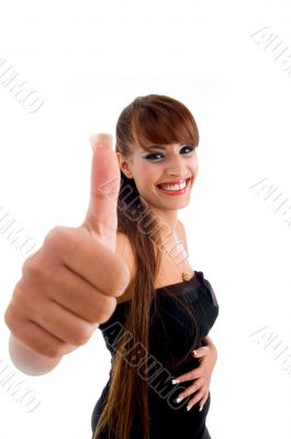 smiling pregnant model showing thumb up