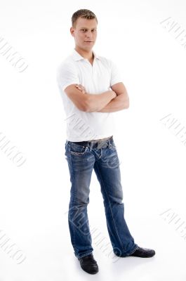 male standing with folded  arms